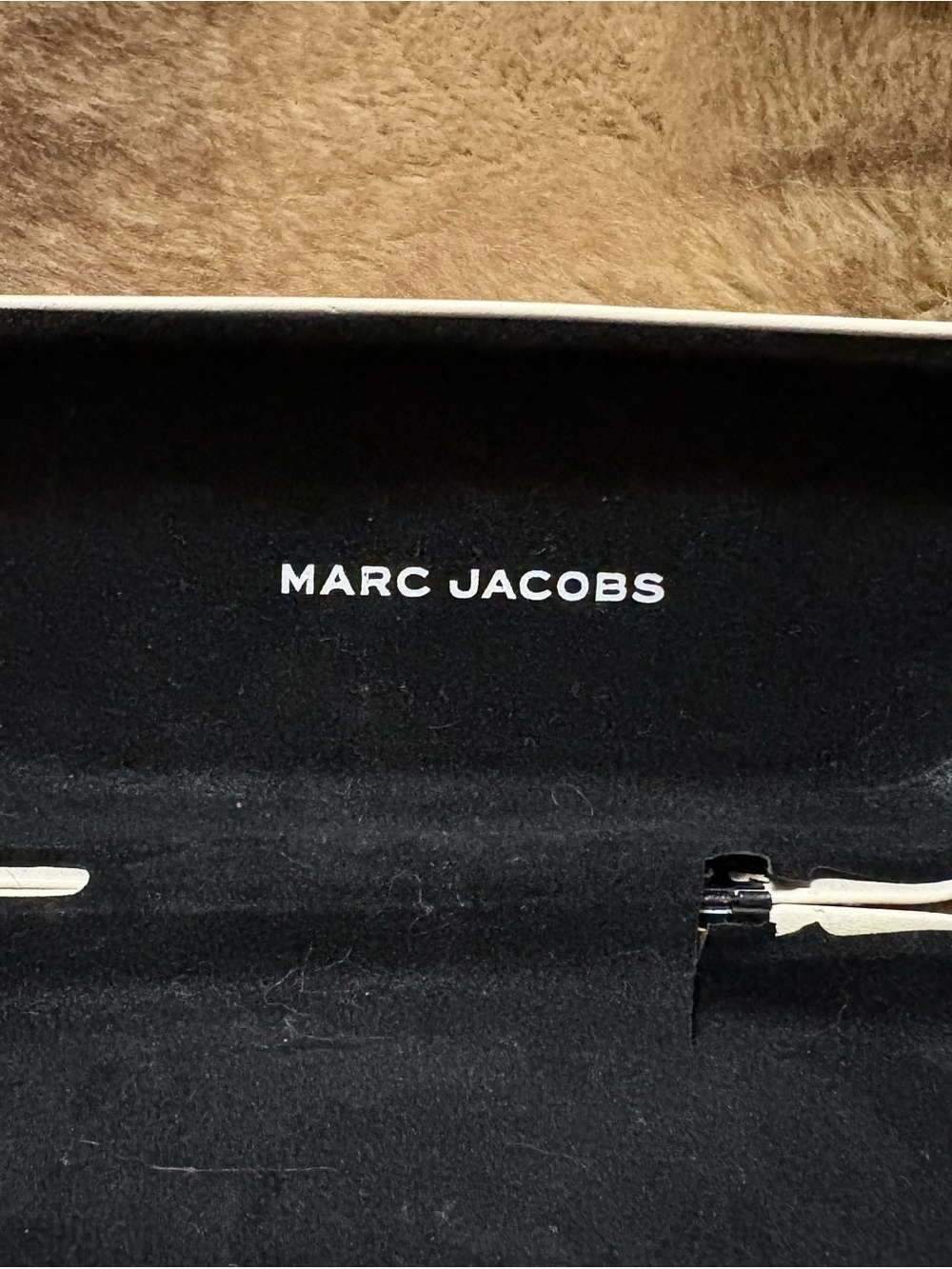 Michael Kors frames and Marc Jacob’s sunglasses case